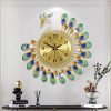 Peacock wall clock – $27+